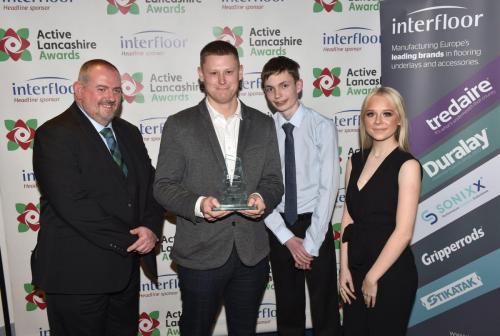 From left - Gary McEwan (Interfloor), Ben Heap (father of Young Achiever winner Liberty) and apprentices from Interfloor, who were invited to present the award-min